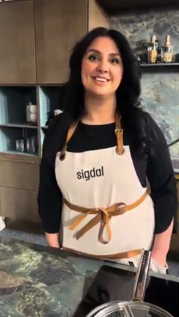 Smiling woman at an exhibition stand